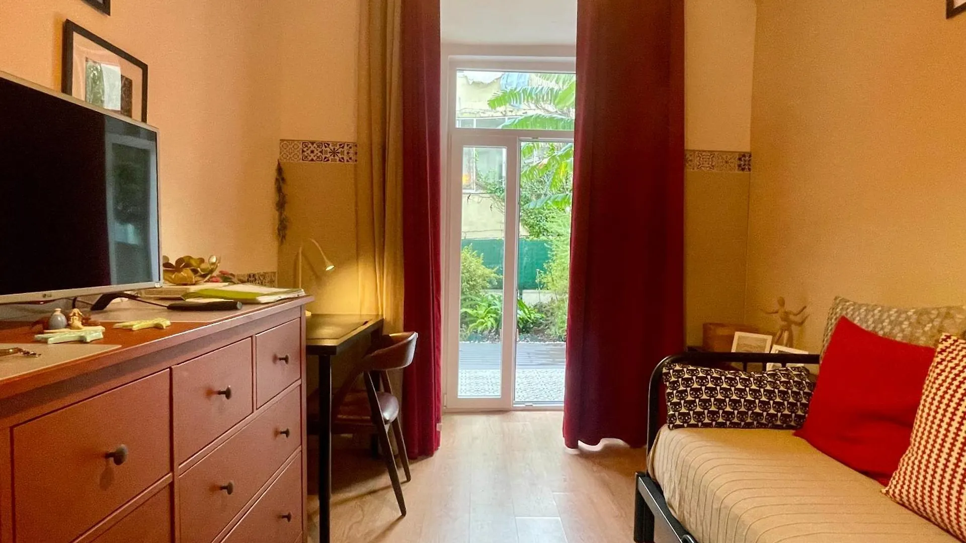 Sunny Orange Garden Apartment In Central Lisboa Portugal