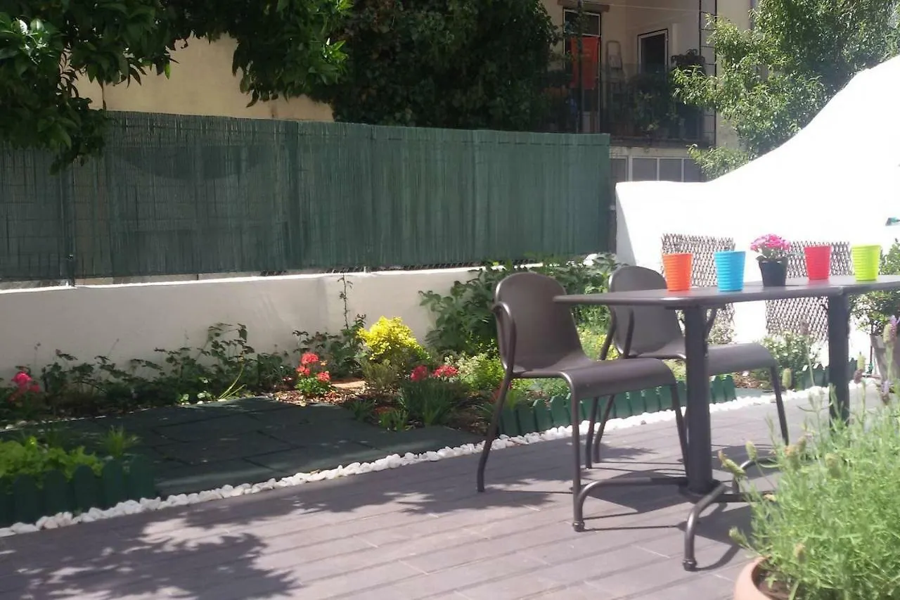 Sunny Orange Garden Apartment In Central Lisboa Portugal
